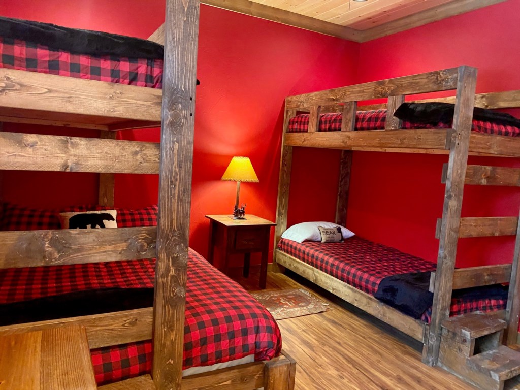 Bunk room in the terrace level with 3 XL twins and 1 queen bed 