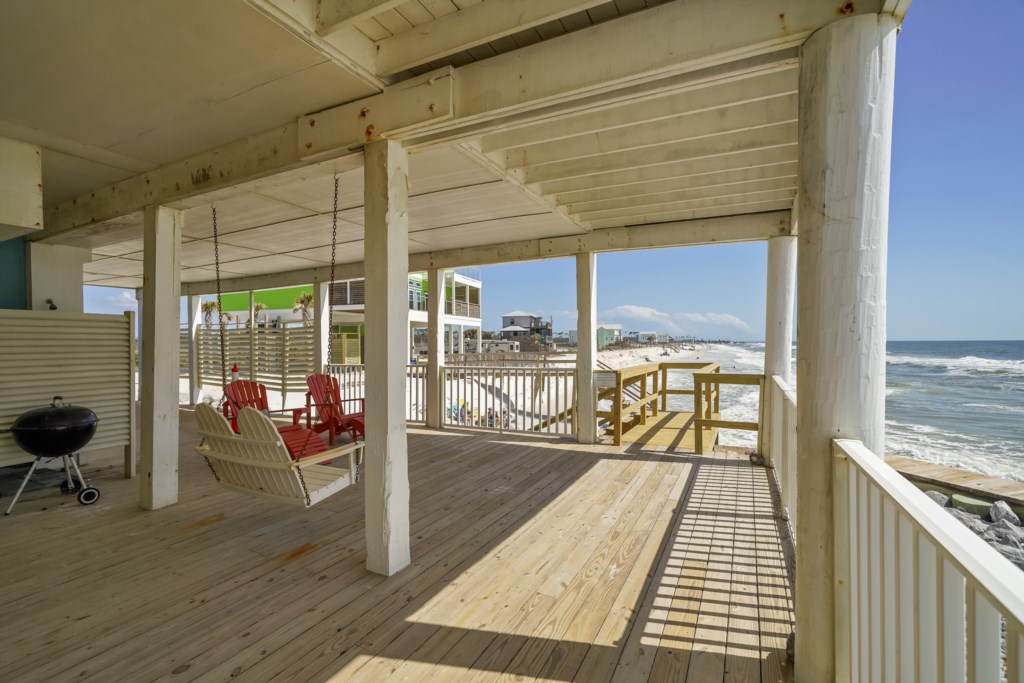 This patio space is shared and provides beach access; the beach size is variable based on tides 