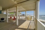 This patio space is shared and provides beach access; the beach size is variable based on tides 