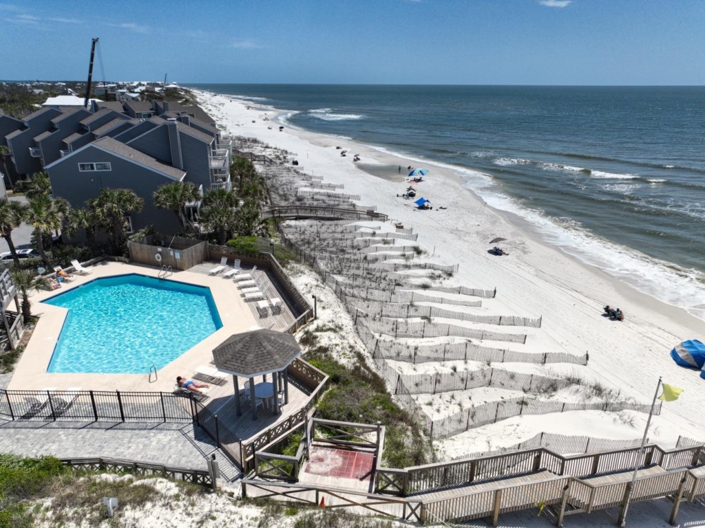 Resort style amenities include 2 shared pools; one pool is Gulf front, playground, fishing ponds, and pickle-ball courts