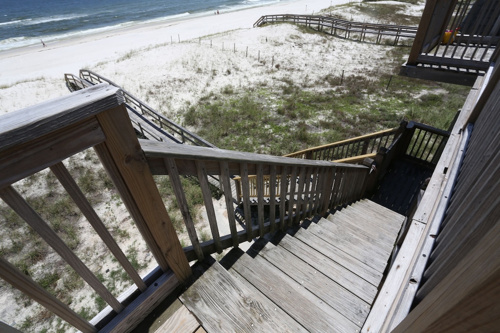 Deck with stairs leading to the beach