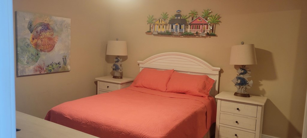 Guest bedroom with queen size bed.