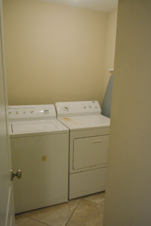 Laundry Room with full size washer and dryer.