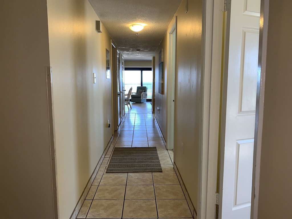 Hallway leading to living area.