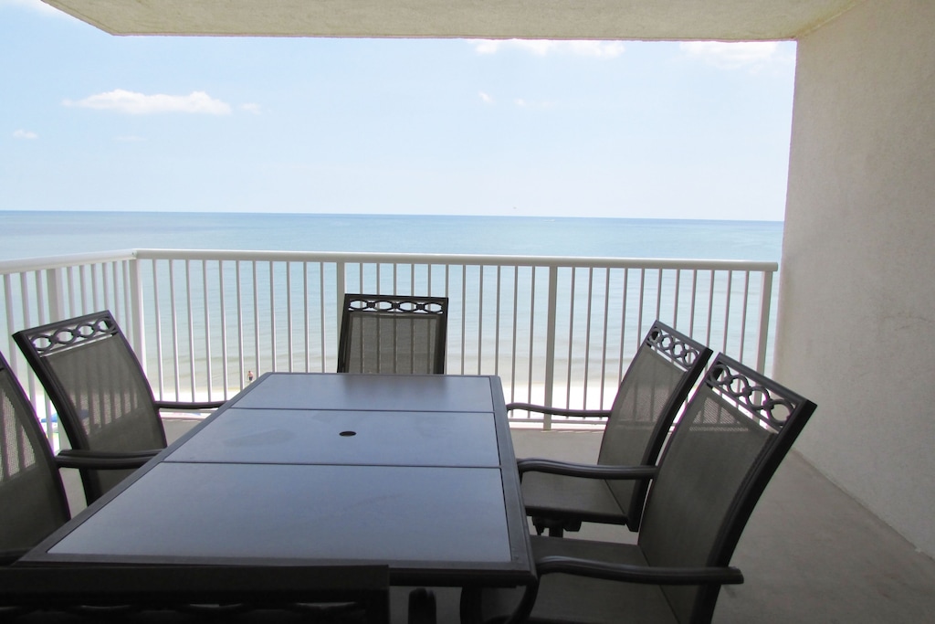 Balcony table overlooking the Gulf.