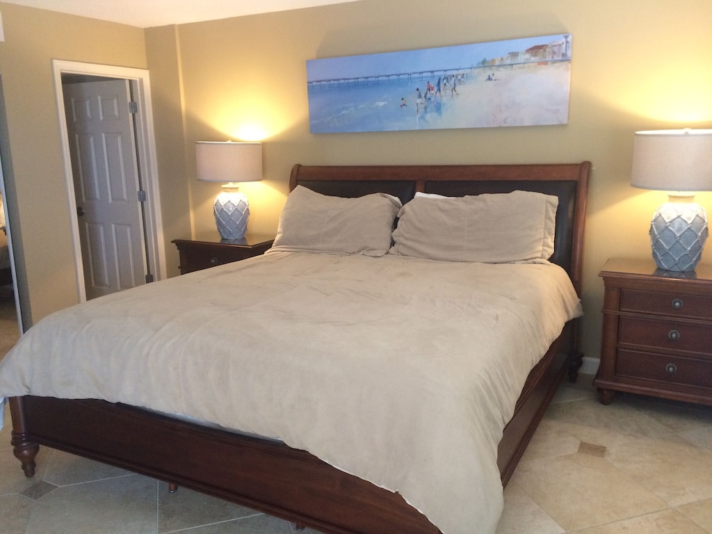 Master bedroom includes a King size bed.