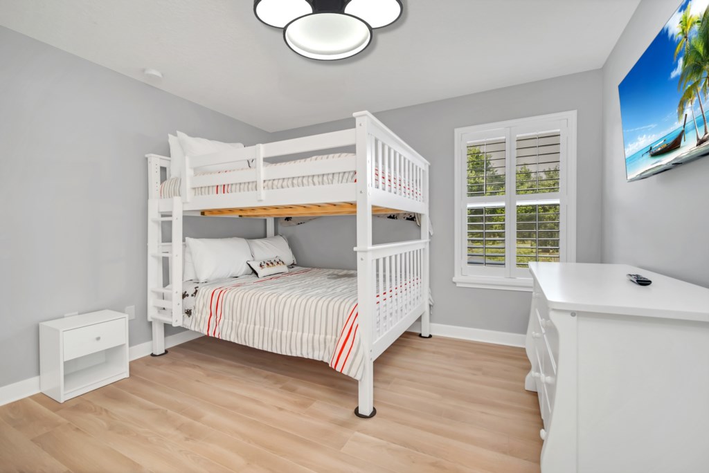 Upstairs children bedroom with two full size beds.
