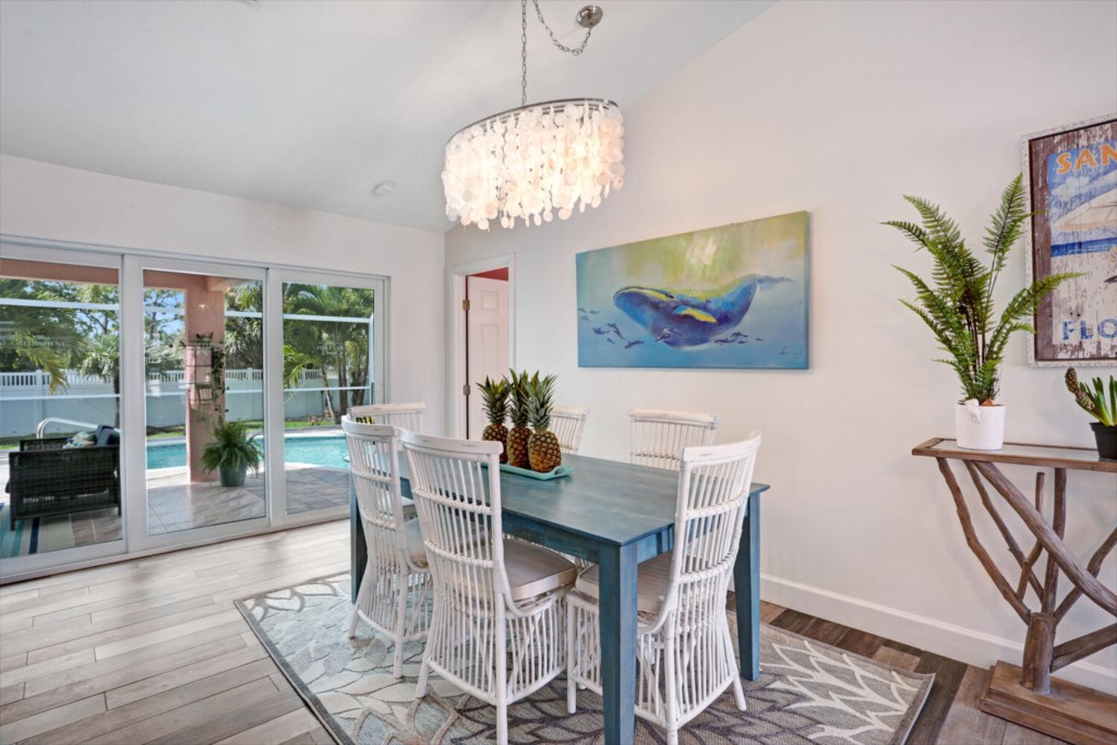Elegant dining area with pool views