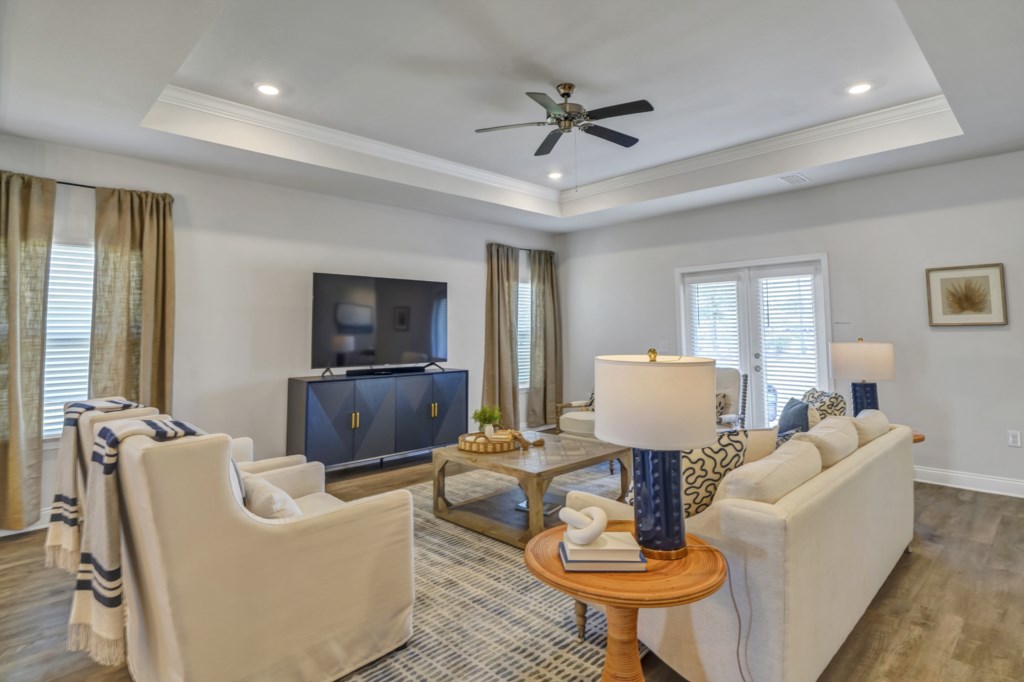 Professionally decorated interior with stunning tray ceilings and luxe finishes 
