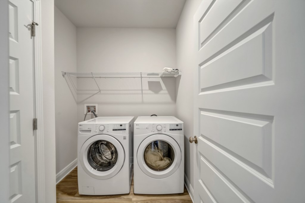 Full Laundry is provided and half bathroom are provided for additional luxe amenities 