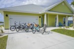 Amenities include 5 adult bikes, 4 beach chairs & umbrella, wagon and cooler 