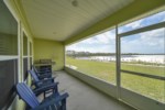 The screened patio overlooks a catch and release fishing pond 