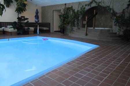 Indoor/Outdoor heated pool and indoor hot tub