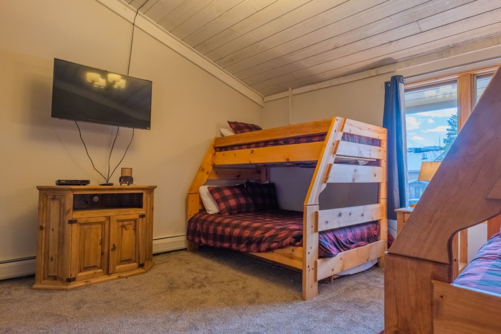 Bedroom 1: Twin over full bunks with hallway bathroom