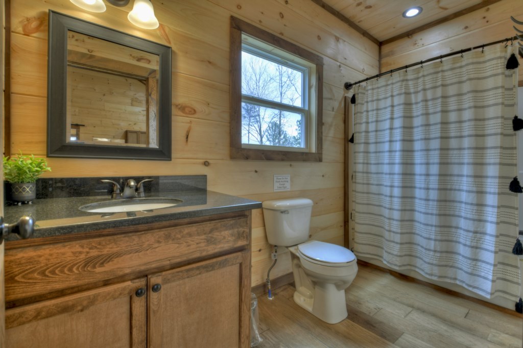 Bathroom on the main level with shower/tub combo