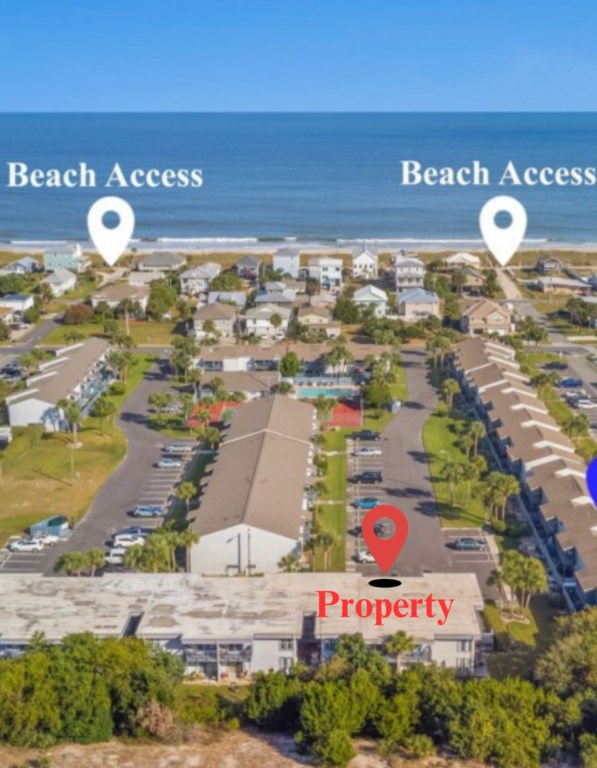 Aerial view of property and beach accesses.