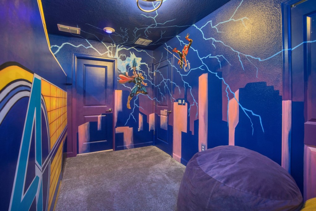 Amazing Avengers room with cool bunk beds with full beds.