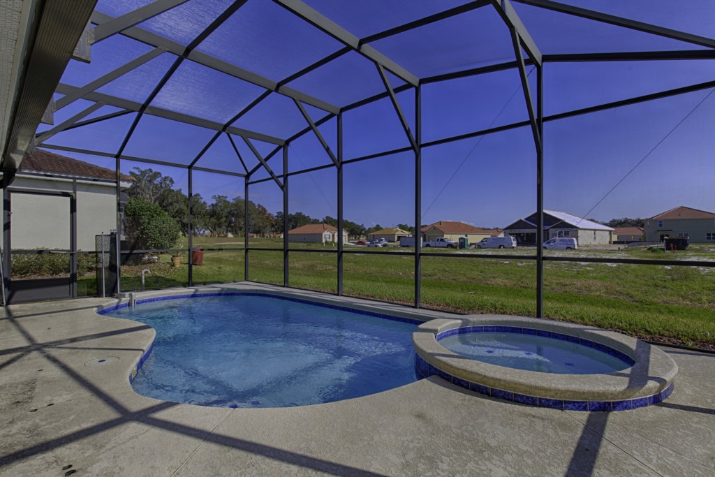 Take in the views and relax in your screened-in pool.