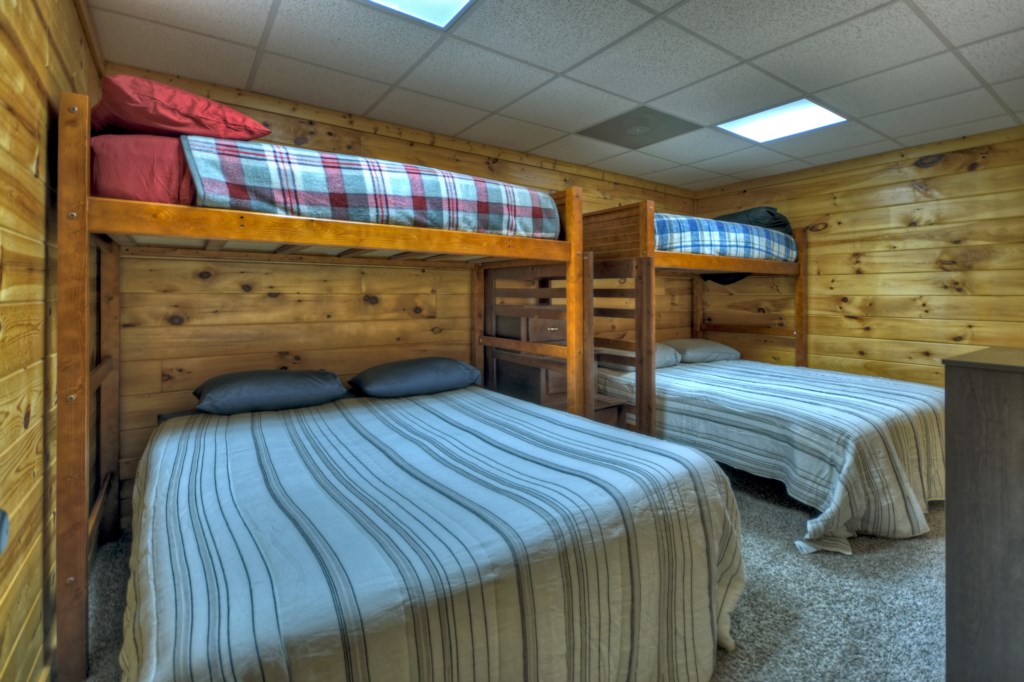 Terrace bedroom with two twin over queen bunks 