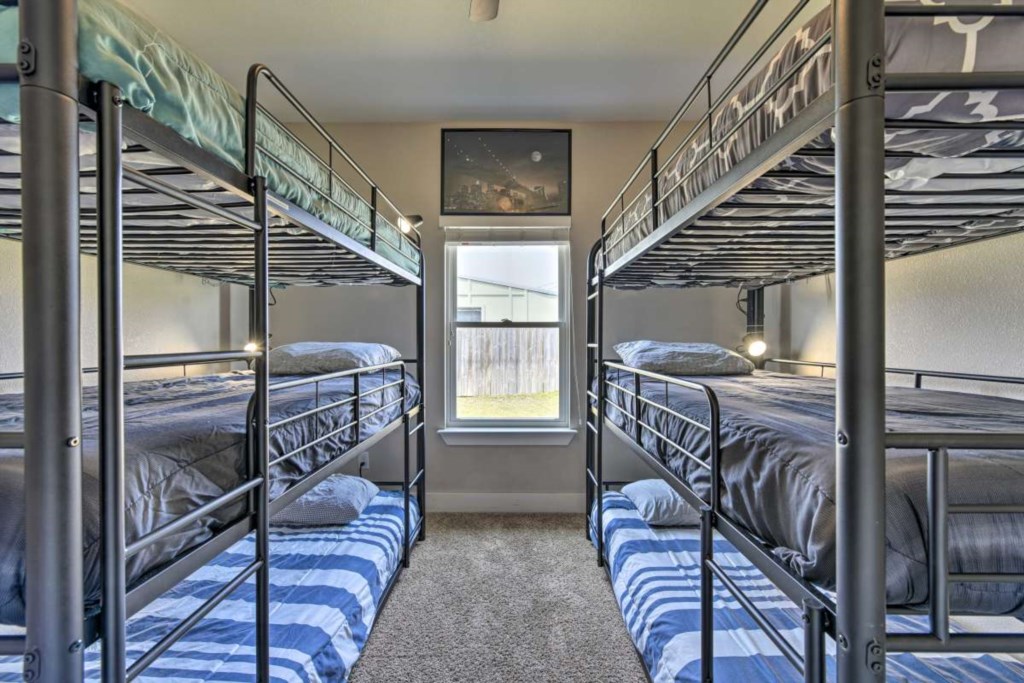 Bedroom 4 | Metropolitan Highrise Room | 2 Tri-Level Bunk Beds | Sleeping for 6 guests | Smart TV