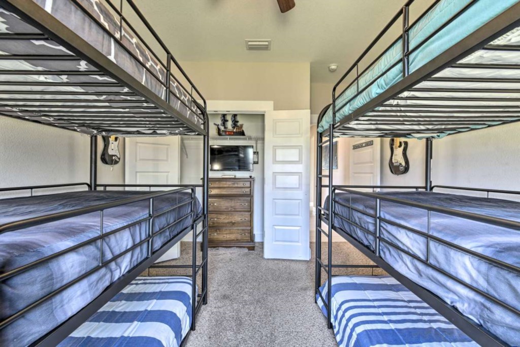 Bedroom 4 | Metropolitan Highrise Room | 2 Tri-Level Bunk Beds | Sleeping for 6 guests | Smart TV