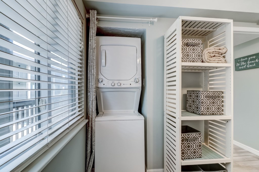 Stackable washer and dryer located in secondary bedroom