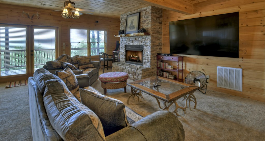 Terrace level living area with seasonal gas fireplace 