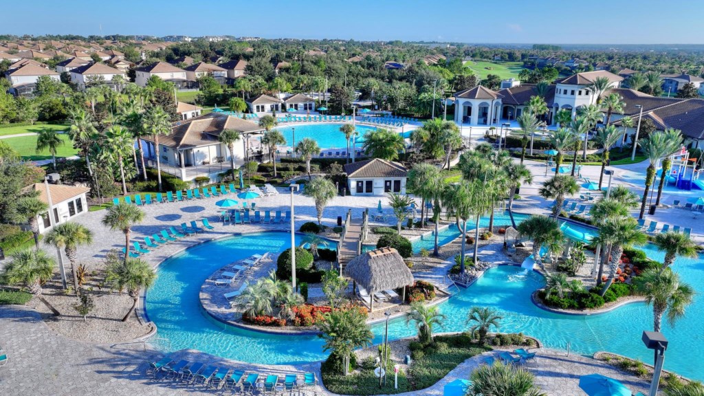 Indulge in the resort’s stunning pool with a lazy river, surrounded by tropical landscaping. (Included in Stay)