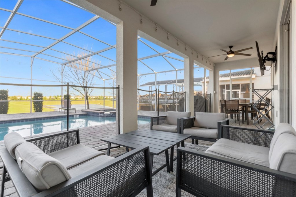 Amazing pool and patio area.  Seating and Dining Area as well as loungers poolside