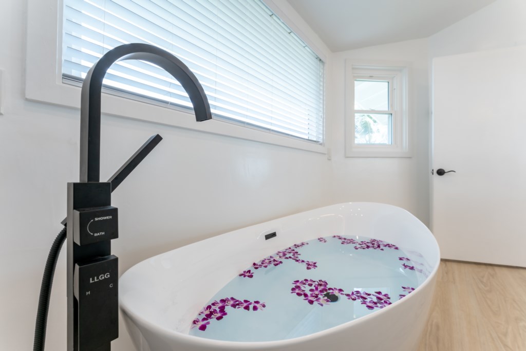 Elegant Soaking Tub - Perfect for Relaxing After a Long Day at the Beach 