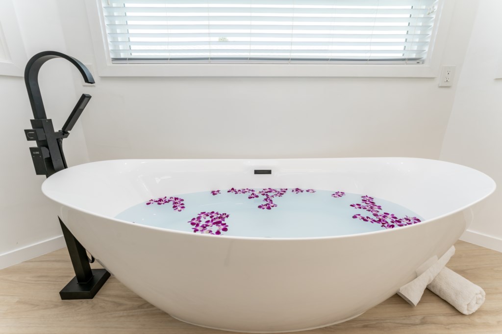 Elegant Soaking Tub - Perfect for Relaxing After a Long Day at the Beach