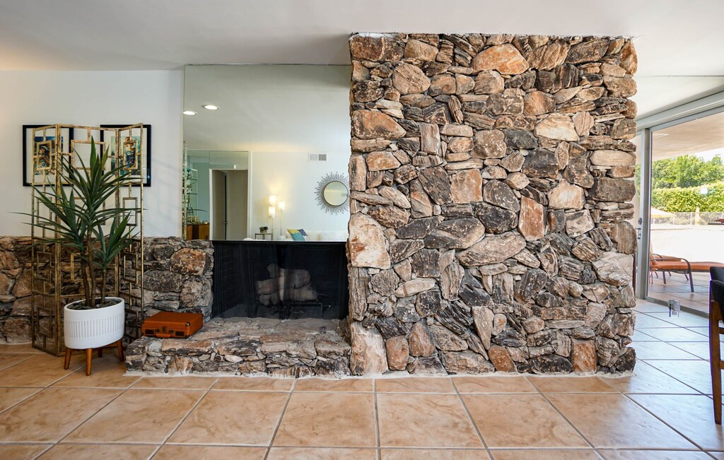Stunning rock walled fireplace