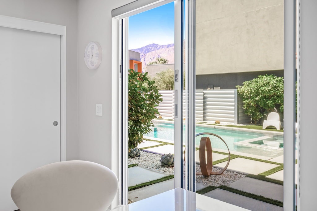Views of the pool and mountains from your at home office