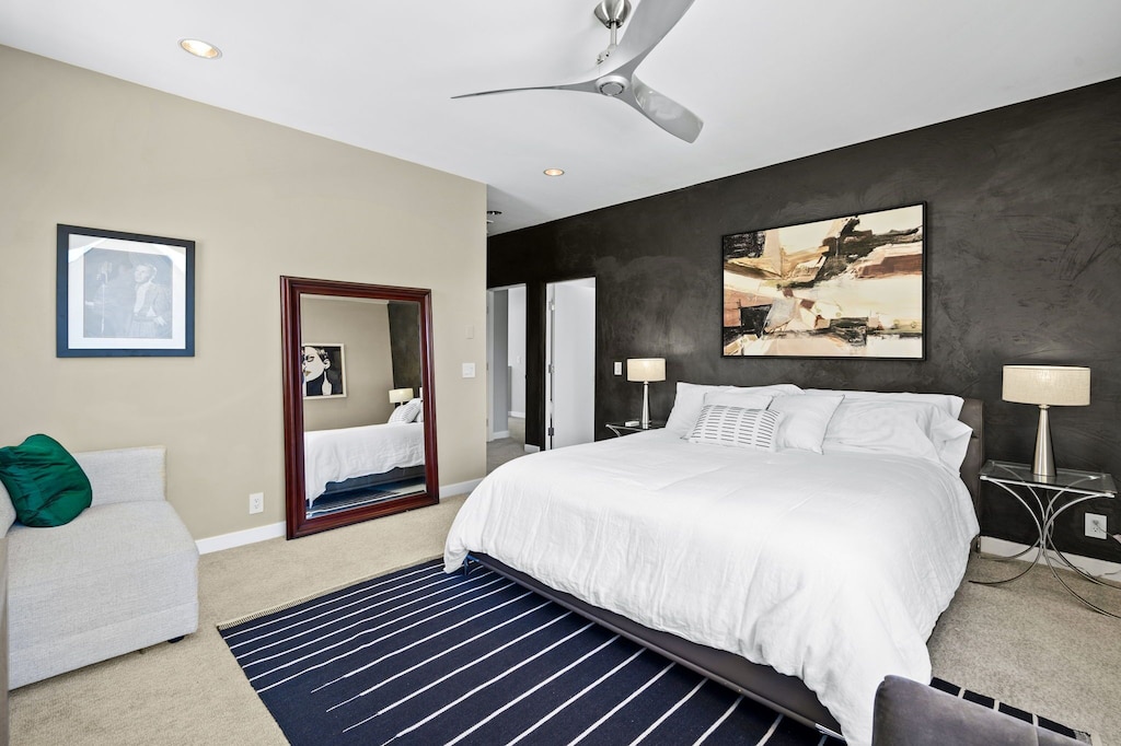 Well appointed master suite with stunning art