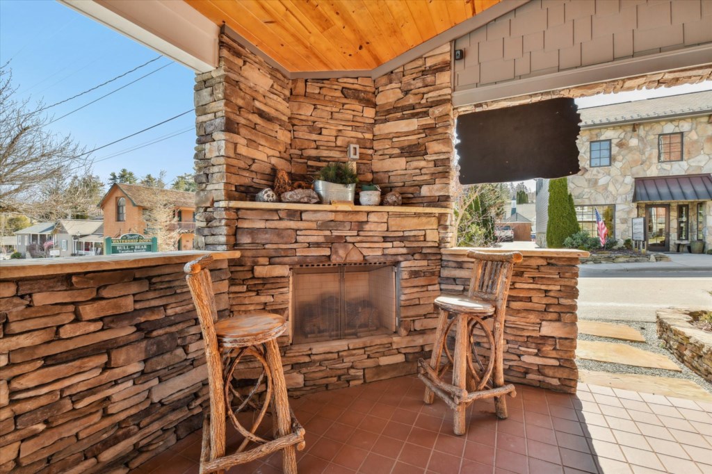 Rustic exterior fireplace