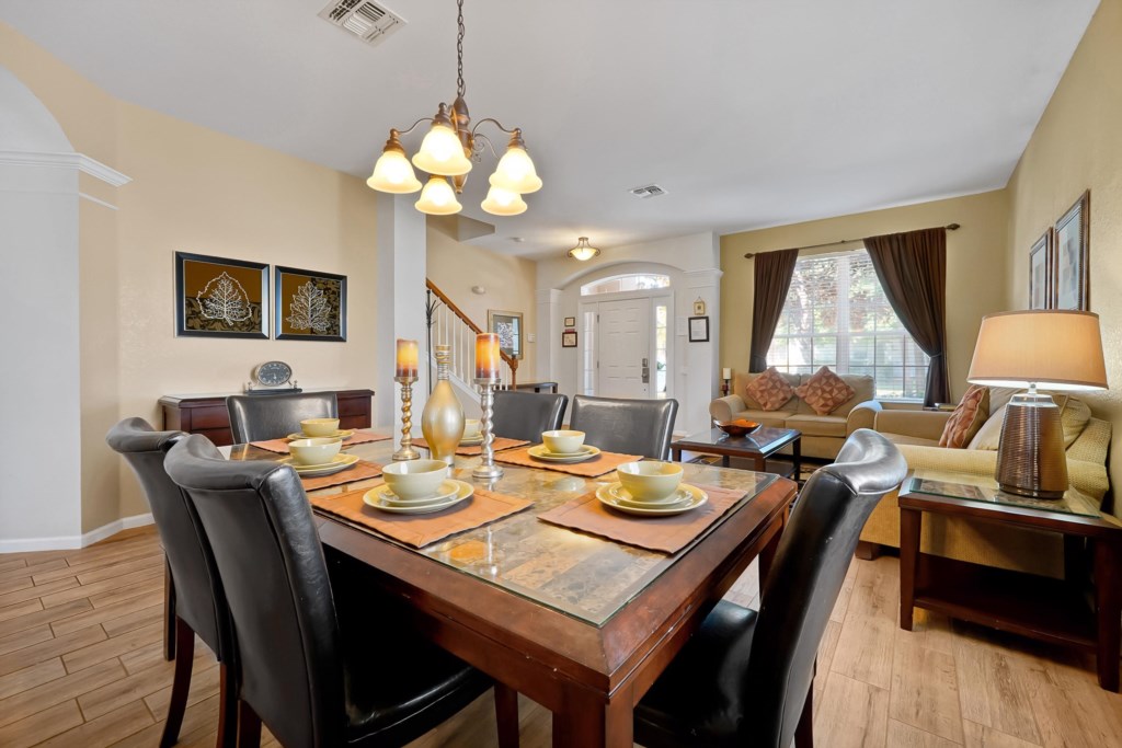 Elegant dining area with seating for six, perfect for family meals and gatherings.
