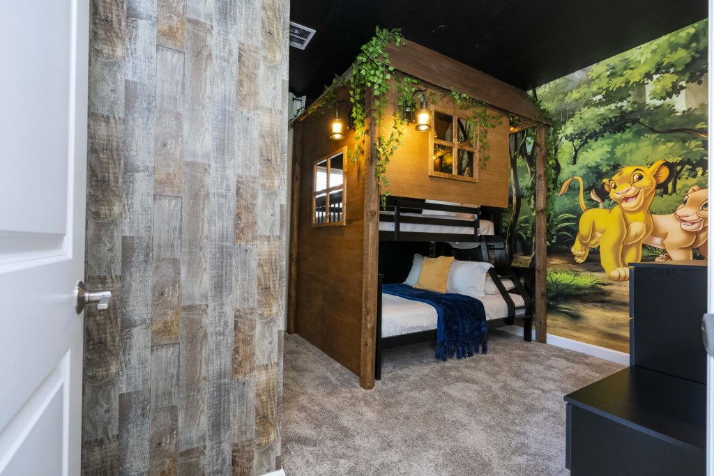 Lion King themed bedroom w/ full + twin bunk bed