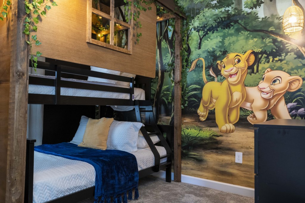 Lion King themed bedroom w/ full + twin bunk bed