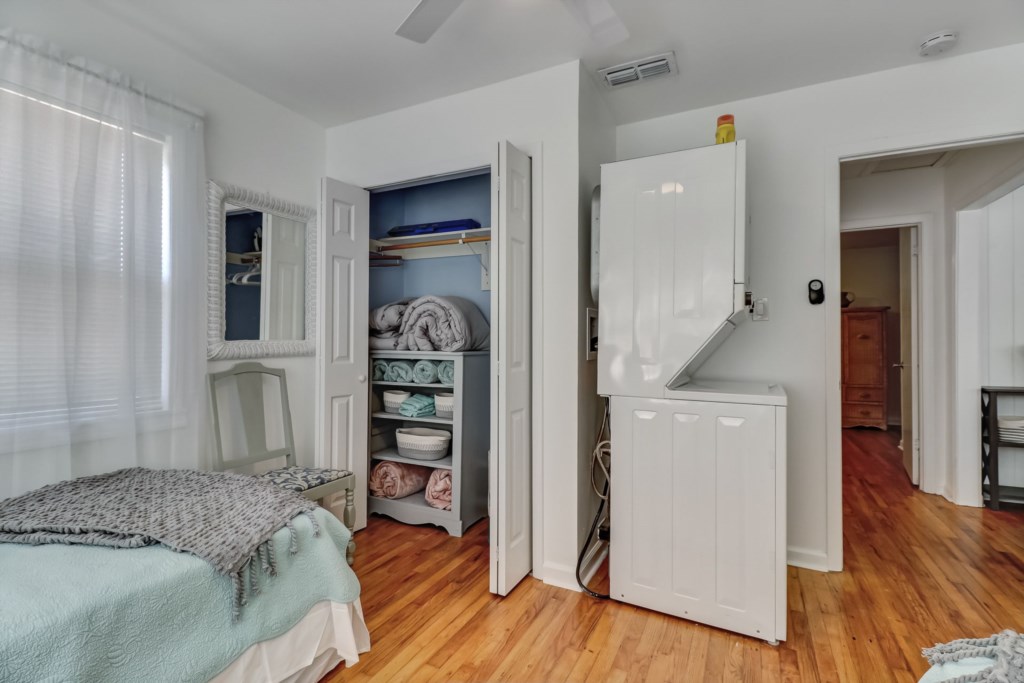 Guest bedroom closet and laundry area.