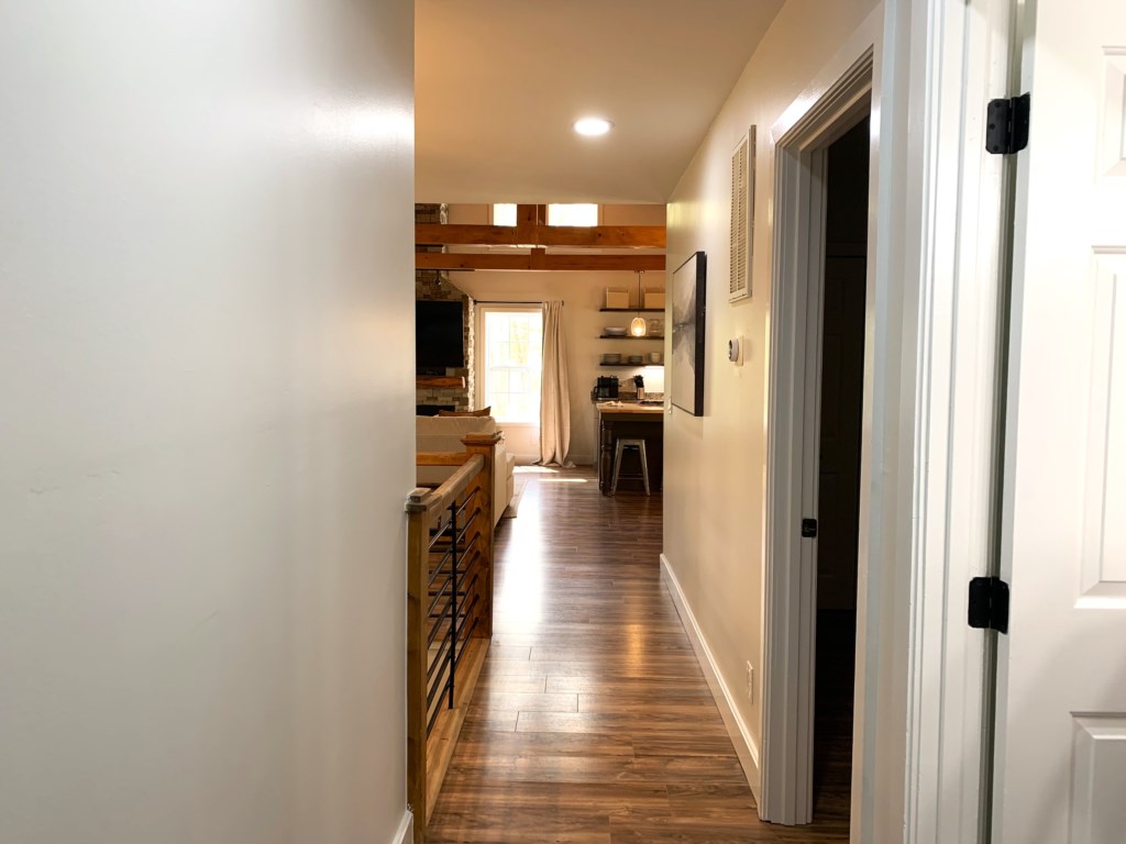 Hallway to living area and kitchen