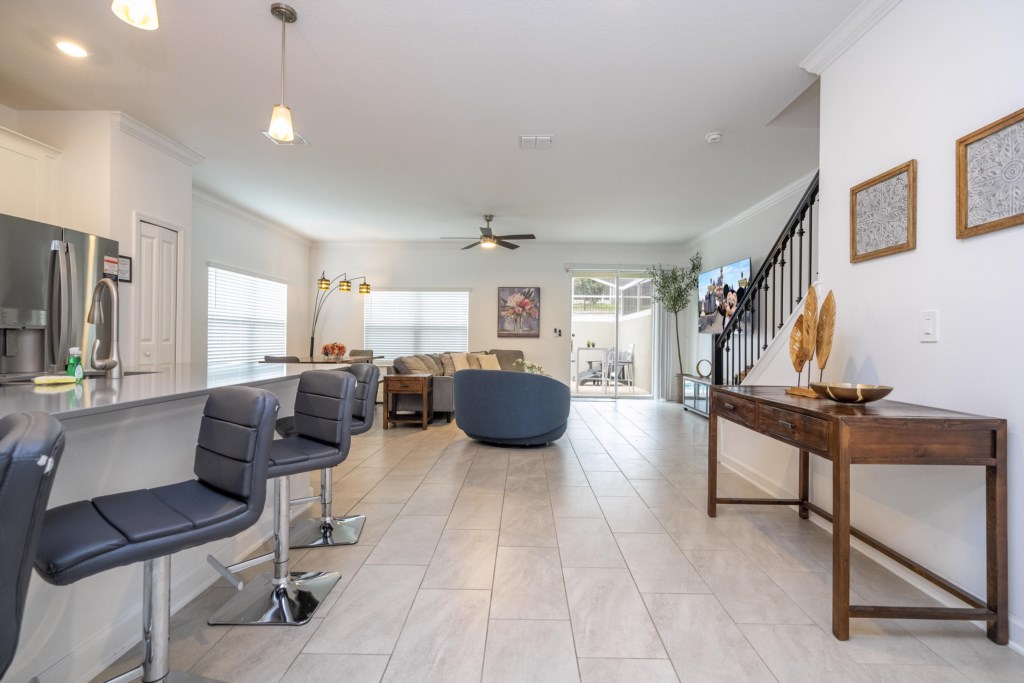 Open floor concept kitchen, dining and living