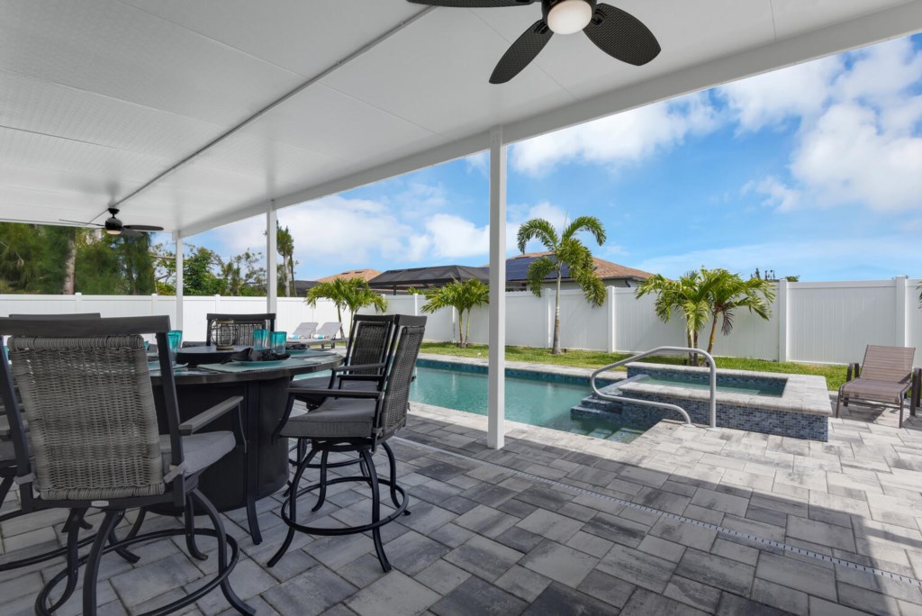 1727 SW 4th St Cape Coral FL-large-033-021-Covered Sitting Area On Pool-1499x1000-72dpi.jpg