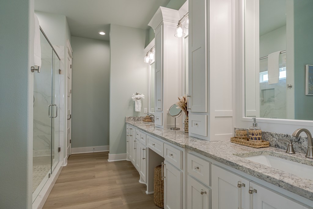 Master ensuite bathroom with walk-in shower and soaking tub