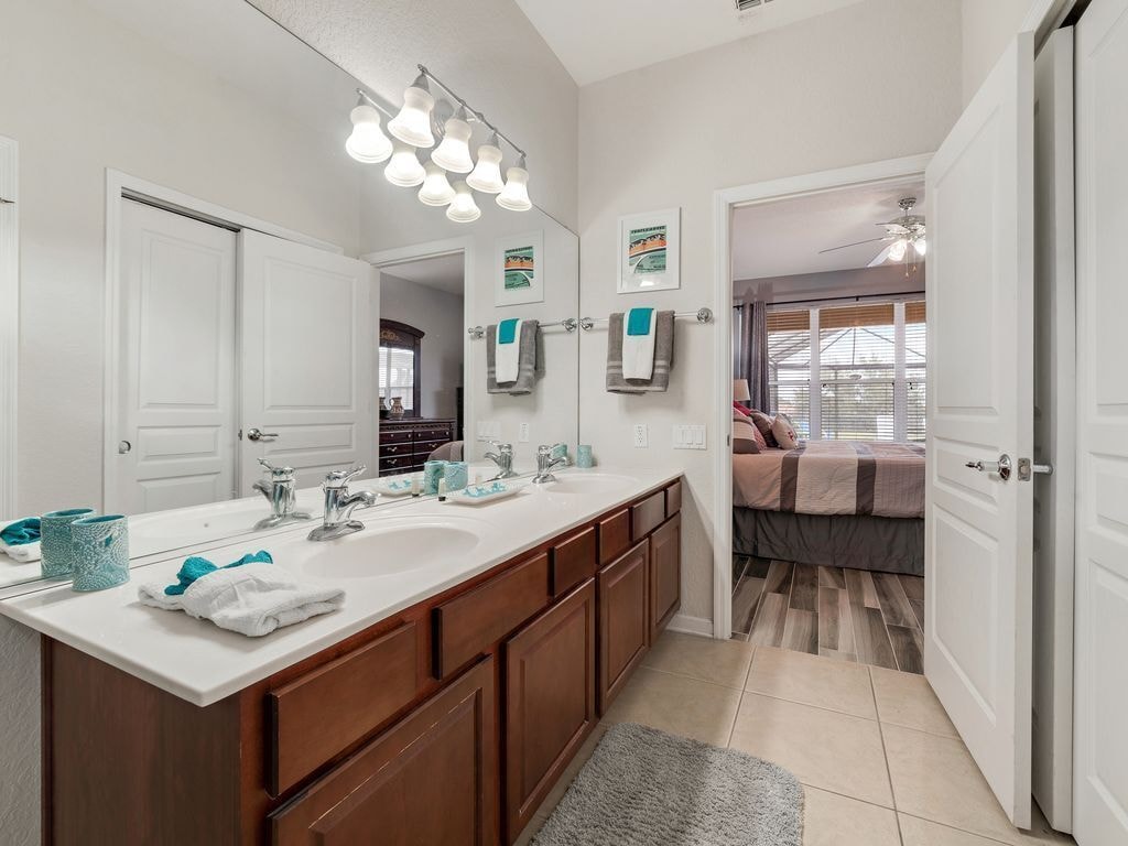 Master bathroom includes double sinks and walk in shower