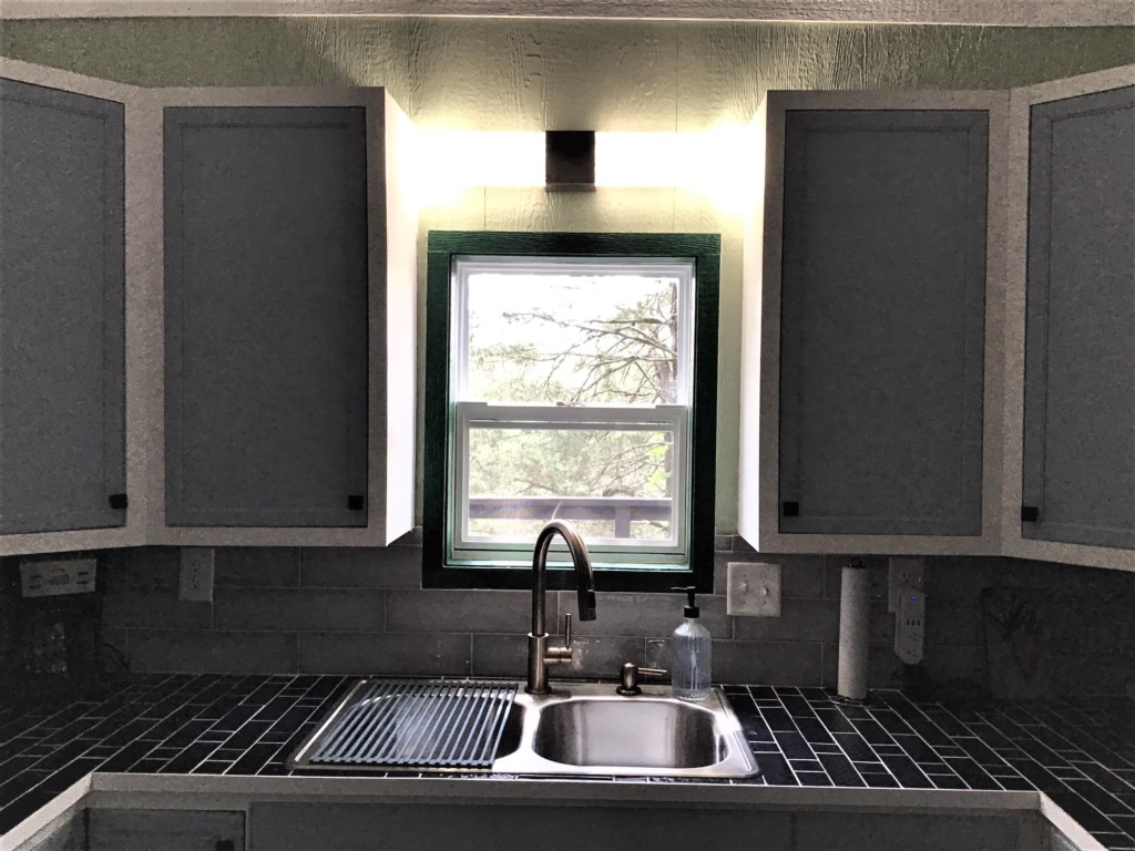 Kitchen sink with a view of the lake.