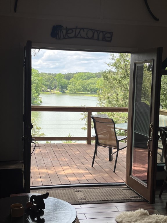 View of the lake from inside to the deck