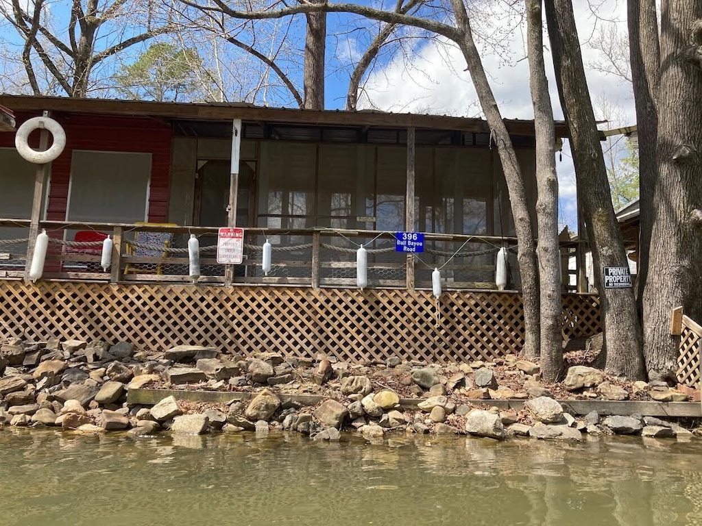 Water side view of the fishing deck along the cabin.