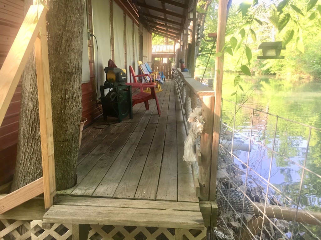 Entrance/Exit from 50' fishing deck to/from the private fenced yard.