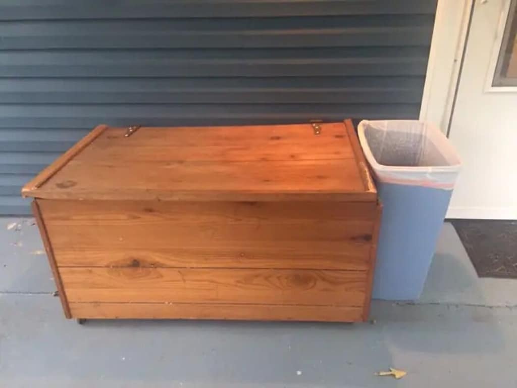 Charcoal can be stored in this box on the patio.