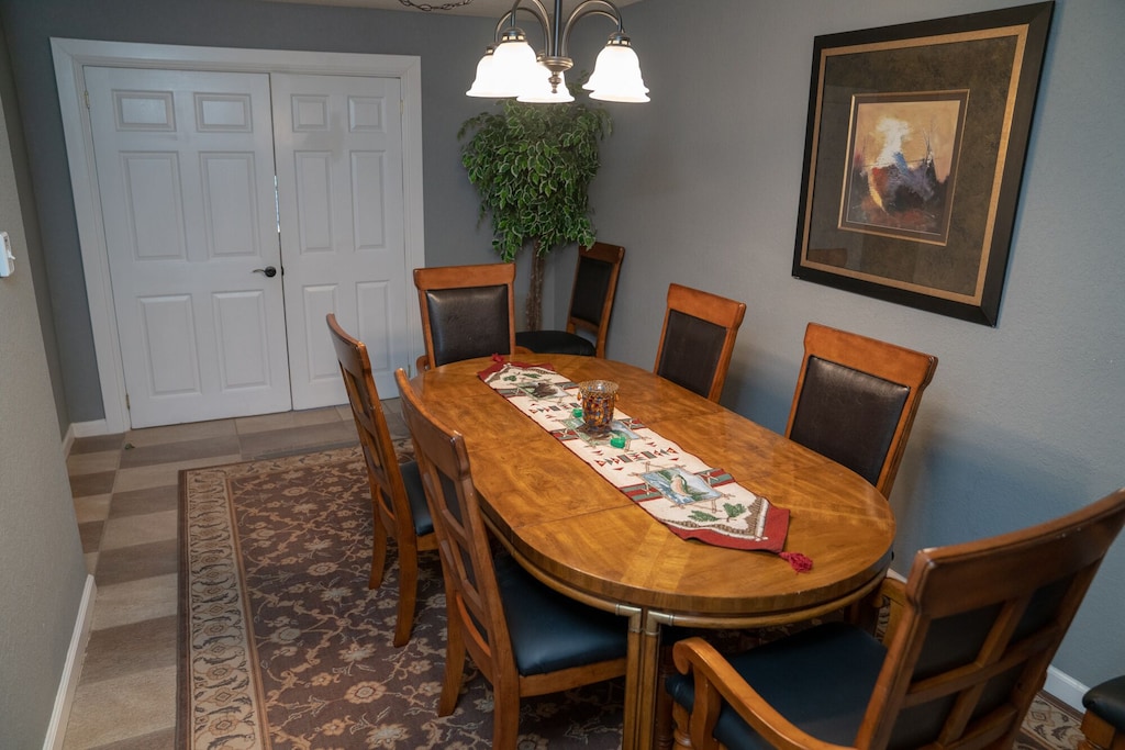 Dining Room off kitchen leads to the card room/pullout couch.